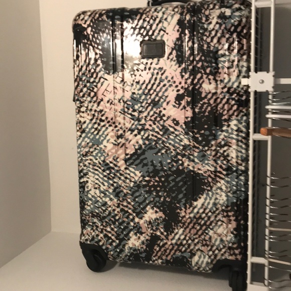 tumi checked luggage